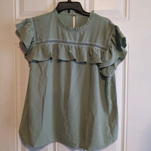 Pale green, ruffle sleeve, high neck top.